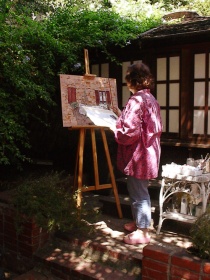 Artist, Carol Worthey at work (photo by Ray Korns)