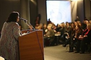 Carol Worthey addresses distinguished audience